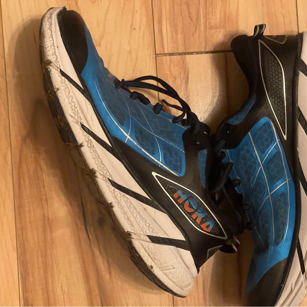 Hoka women’s size 10 Black and Blue Athletic Shoes used